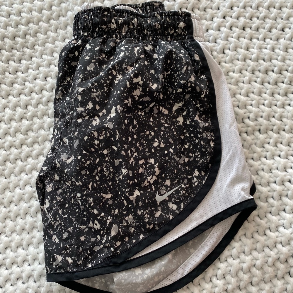 Black and white speckled nike running shorts